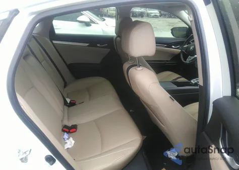 2019 Honda Civic Touring z USA, uszkodzony, nr VIN JHMFC1F90KX002322